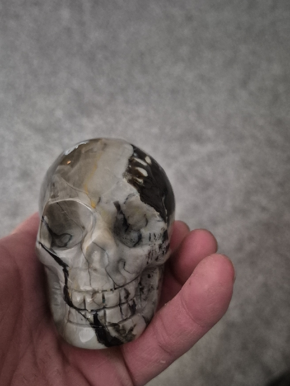 Handheld Marble Skull Sculpture - White and Black Accent